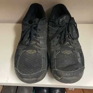 Black Nike running shoes. Size 11.